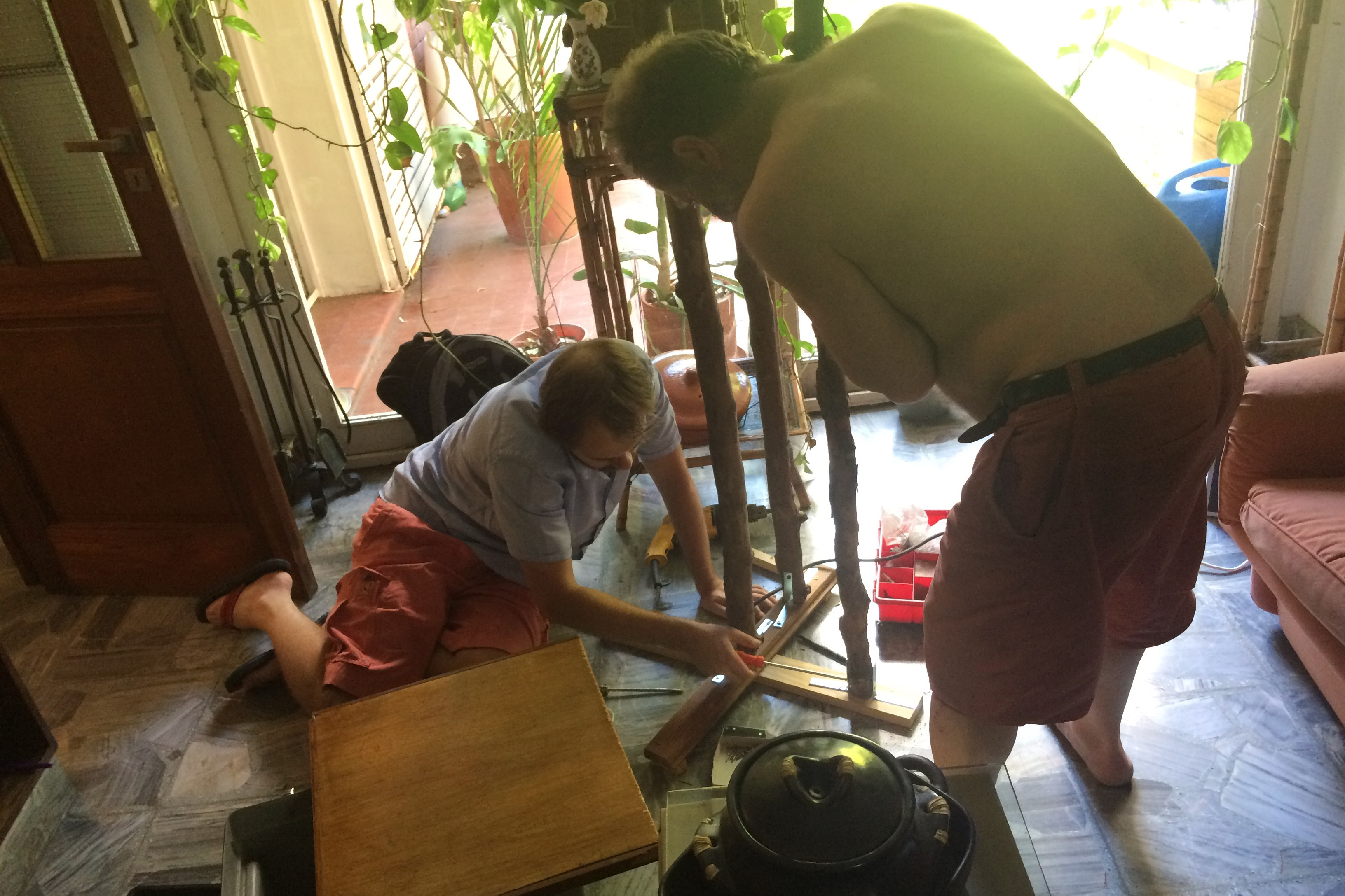 James and my father building a Christmas tree